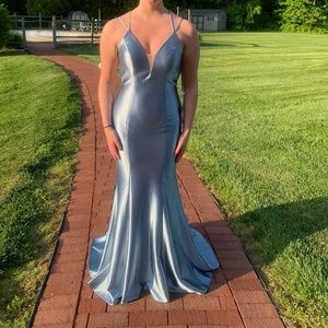 Never worn, backless, metallic blue prom dress